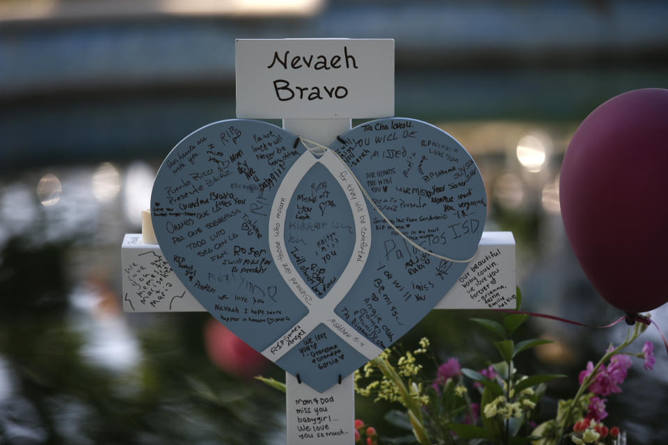 Nevaeh Bravo's cross stands at a memorial site for the victims killed in this week's shooting at Robb Elementary School in Uvalde, Texas, Friday, May 27, 2022. (AP Photo/Dario Lopez-Mills)