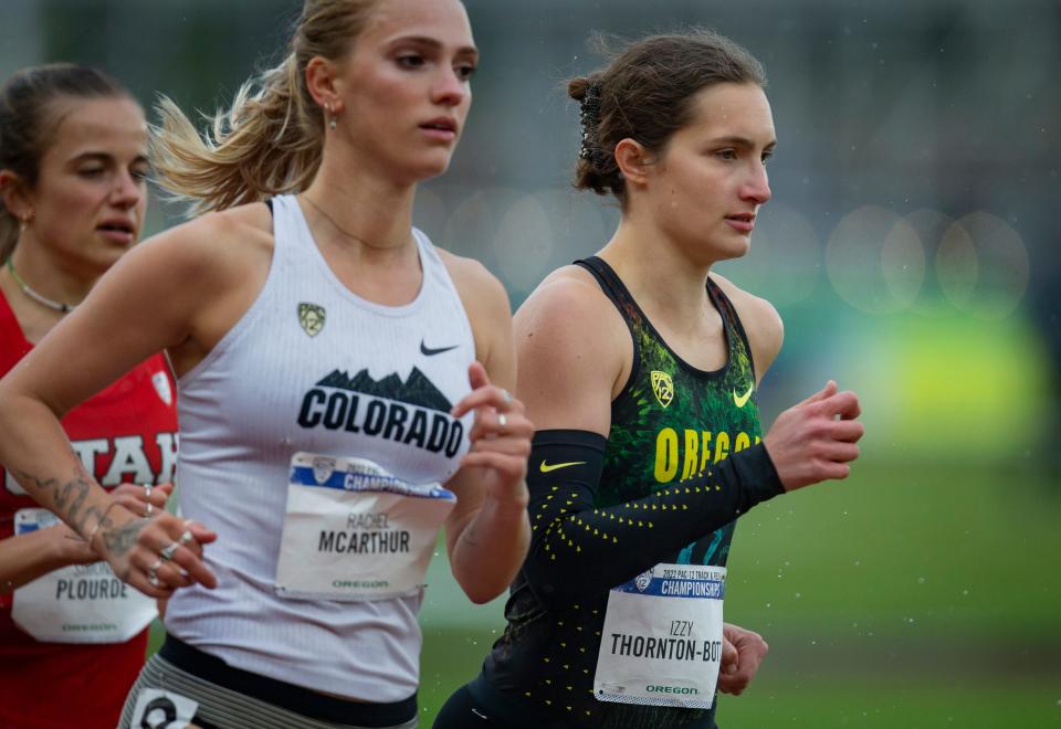 Oregon's Izzy Thornton-Bott. right, competes in the women's 1500-meter Friday, May 13, 2022, at the Pac-12 Track & Field Championships at Hayward Field in Eugene.