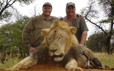 American dentist Walter Palmer (left), who hunted Cecil the lion in Zimbabwe, with earlier prey