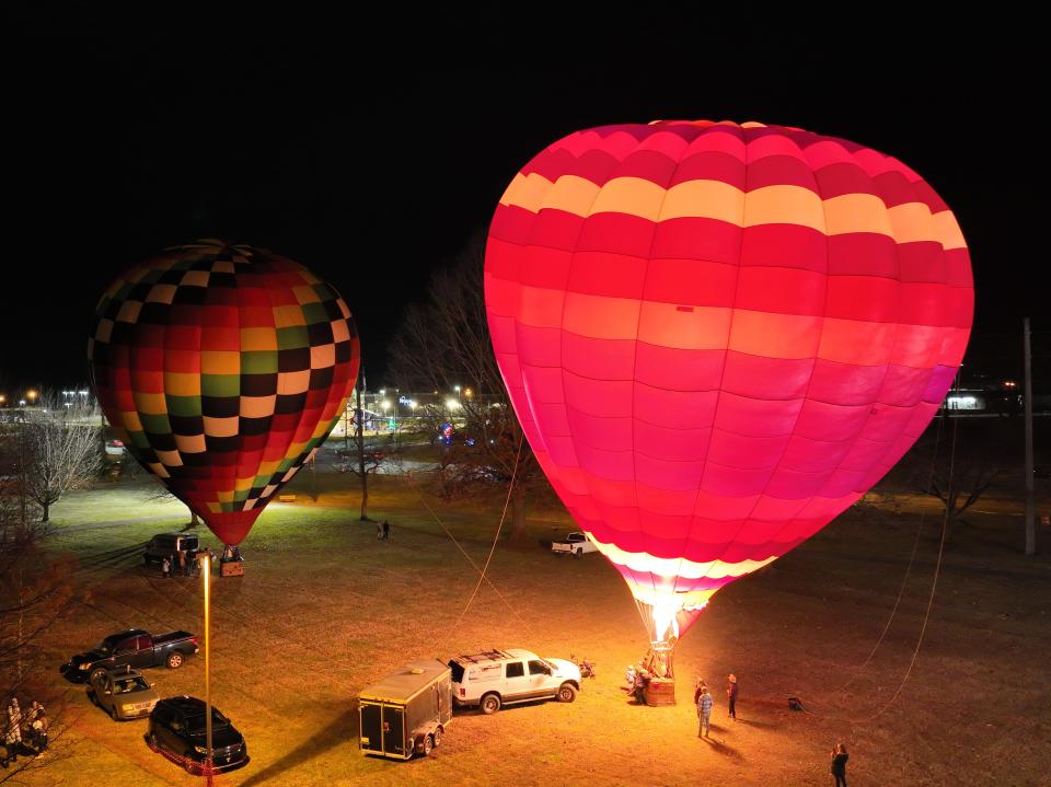 Two hot air balloons were inflated and ready to lift New Year's Eve party patrons above Bissell Park, but unfortunately winds prevented this, according to Free Medical Clinic of Oak Ridge Executive Director Billy Edmonds.