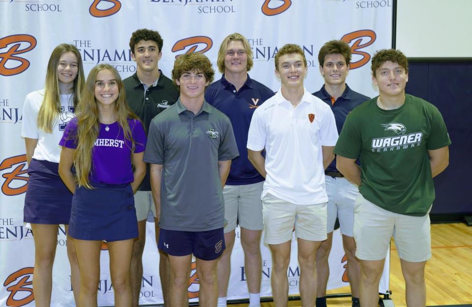 A group of Buccaneers off to college gather for a picture at The Benjamin School's signing ceremony.