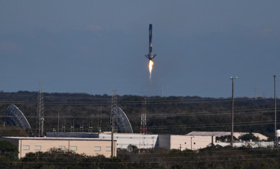 The NG-20 SpaceX Falcon 9 first-stage booster returns to Landing Zone 1 at Cape Canaveral Space Force Station.