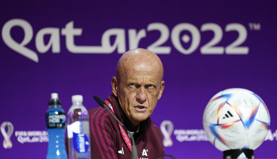 Chairman of the FIFA referees committee Pierluigi Collina reacts at a press conference of the FIFA referees at the World Cup media center in Doha, Qatar, Friday, Nov. 18, 2022.(AP Photo/Martin Meissner)