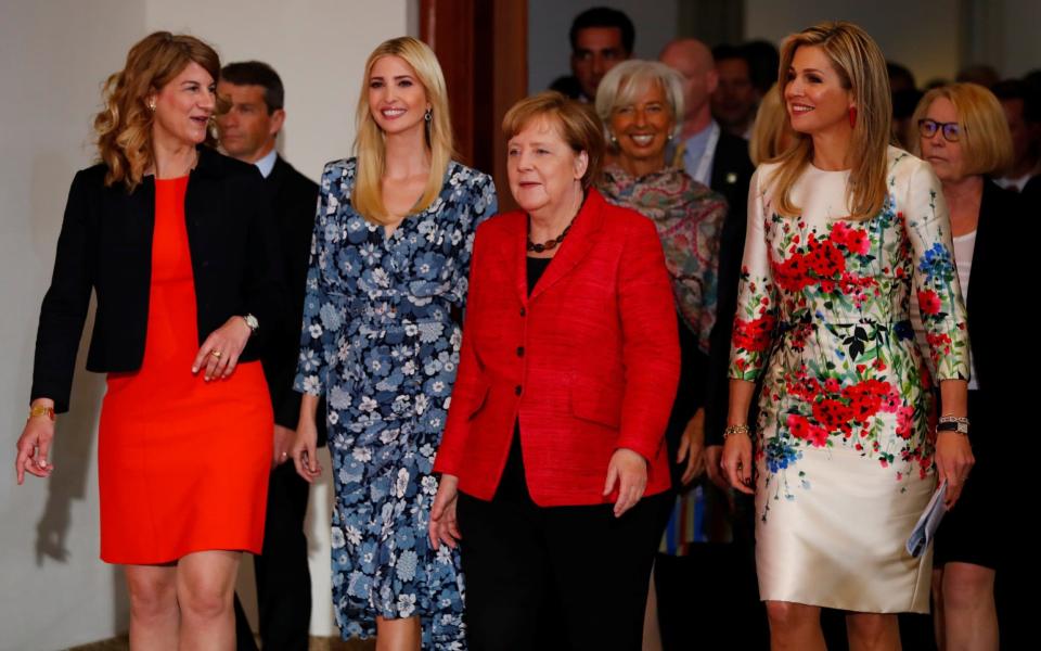 Ivanka Trump, Angela Merkel and Queen Maxima of the Netherlands arrive at the W20 Summit - Credit: Reuters