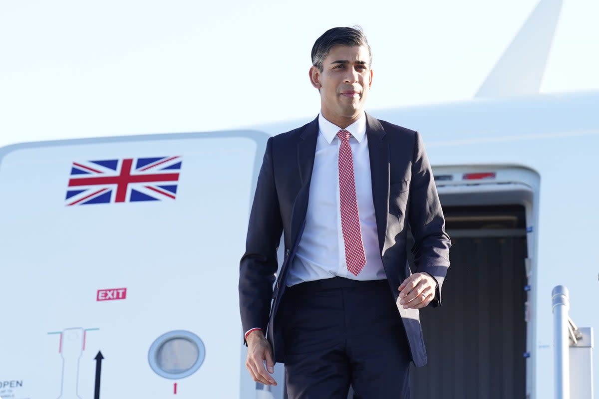 Rishi Sunak disembarks from his plane as he arrives in San Diego for the Aukus summit (Stefan Rousseau/PA) (PA Wire)