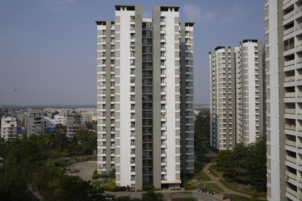 High-rise residential buildings housing thousands of people facing water crisis stand in Whitefield neighborhood of Bengaluru, India, Monday, March 11, 2024. Water levels are running desperately low, particularly in poorer regions, resulting in sky-high costs for water and a quickly dwindling supply. (AP Photo/Aijaz Rahi)