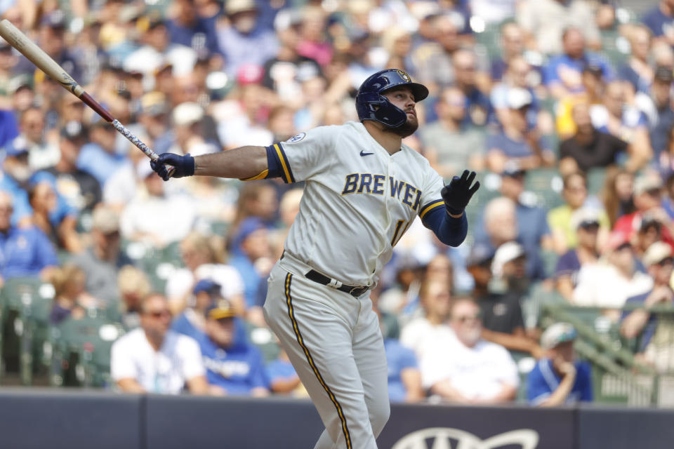 Milwaukee Brewers's Rowdy Tellez drives in a run with a sacrifice fly in the fifth inning of a baseball game against the Kansas City Royals, Wednesday, July 21, 2021, in Milwaukee. (AP Photo/Jeffrey Phelps)