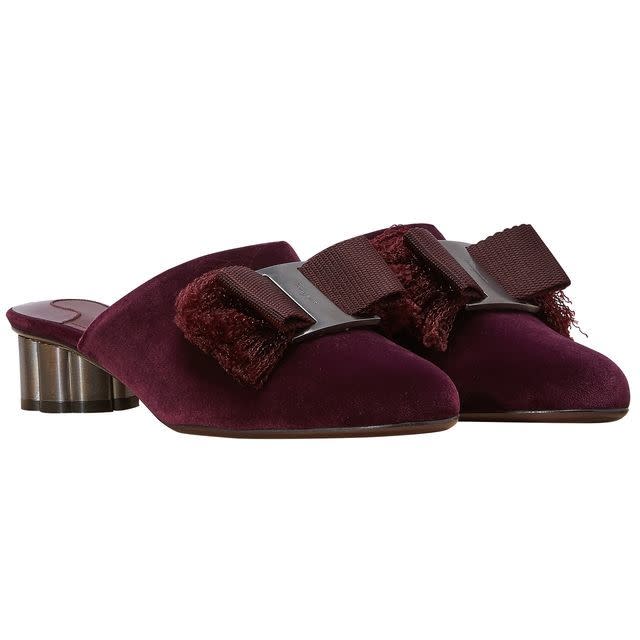 <p><em>Salvatore Ferragamo mules</em><em>, </em><span>£435, <a rel="nofollow noopener" href="https://www.24sevres.com/en-gb/velvet-mules-salvatore-ferragamo_45RSF?color=deep-bordeaux" target="_blank" data-ylk="slk:24Sévres;elm:context_link;itc:0;sec:content-canvas" class="link ">24Sévres</a></span></p>