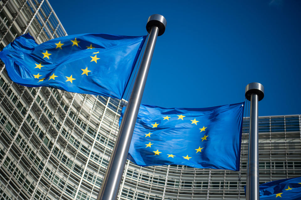 10 June 2019, Belgium, Brüssel: Flags of the European Union fly in the wind in front of the Berlaymont building, the seat of the European Commission. Photo: Arne Immanuel Bänsch/dpa (Photo by Arne Immanuel Bänsch/picture alliance via Getty Images)