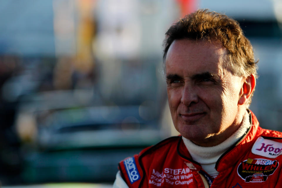 LOUDON, NH - SEPTEMBER 19: Mike Stefanik, driver of the #1 Paquin Insurance Chevrolet, stands in the garage area during qualifying for the NASCAR Whelen Modified Tour F.W. Webb 100 at New Hampshire Motor Speedway on September 19, 2014 in Loudon, New Hampshire.  (Photo by Jeff Zelevansky/NASCAR via Getty Images)