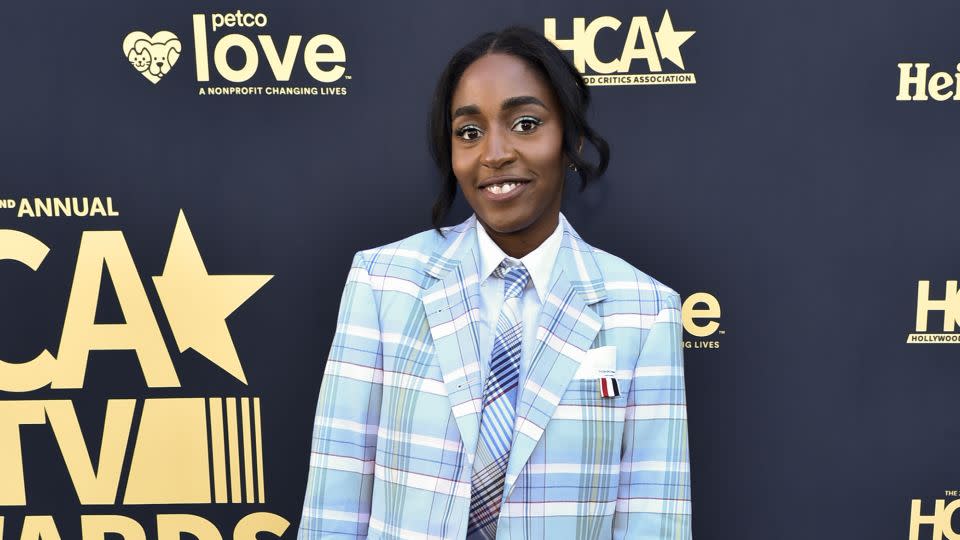 At the HCA TV Awards on August 14, 2022, Edebiri favored suiting again, this time in a relaxed pale blue check two piece with clashing tie by Thom Browne. - Rodin Eckenroth/WireImage/Getty Images