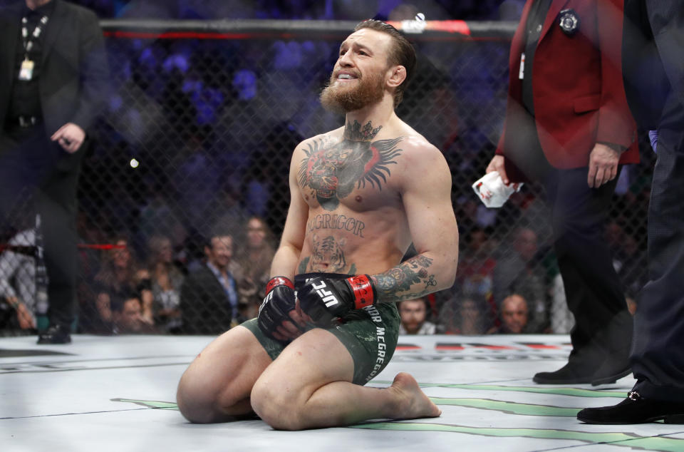 Conor McGregor smiles after defeating Donald "Cowboy" Cerrone during a UFC 246 welterweight mixed martial arts bout Saturday, Jan. 18, 2020, in Las Vegas.