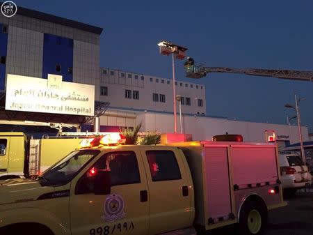 Members of Saudi Civil Defence work at Jazan General Hospital following a pre-dawn fire in the port city of Jazan, Saudi Arabia December 24, 2015. REUTERS/Saudi Press Agency/Handout via Reuters