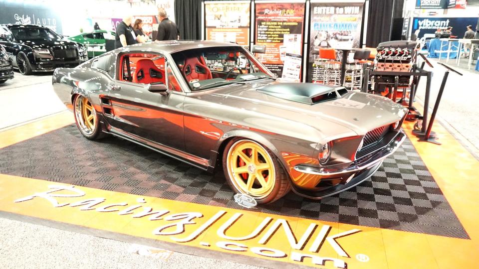 a mustang fastback at sema on display