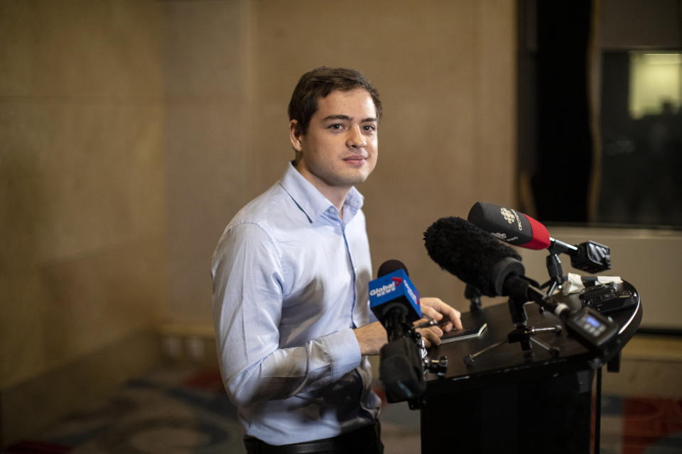 Alexander Vavilov, the Toronto-born son of Russian spies, whose Canadian citizenship has now been affirmed by the Supreme Court of Canada, speaks to media in Toronto, Friday, Dec. 20, 2019. (Chris Young/The Canadian Press via AP)