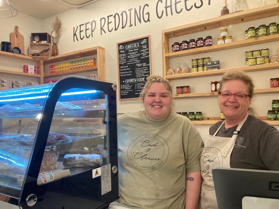 Cask & Cleaver co-owners Kaitlyn Rodney, left, and Jennifer Berry stand behind the counter of their shop in downtown Redding.