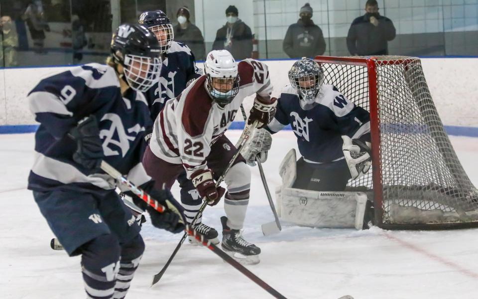 Quinn Pine of Bishop Stang sets up shop in front of Nantucket goaltender Griffin Starr late in the third period of Saturday afternoon's game at Hetland Arena.