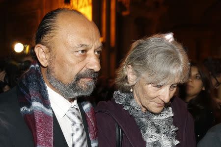 Itsik and Kate Zeitouni, parents of Lee Zeitouni, arrive for the start of the trial of driver Eric Robic and passenger Claude Khayet at the Paris courthouse November 27, 2014. REUTERS/Jacky Naegelen