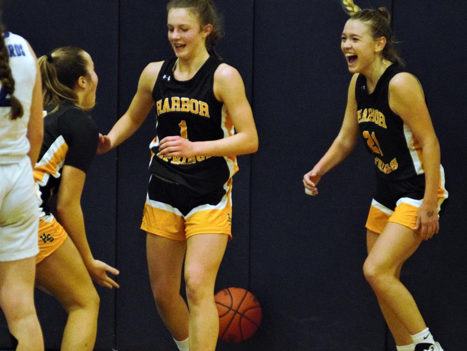 There were plenty of reasons to celebrate around the Harbor Springs girls' basketball team Tuesday, as they evened things up atop the LMC with a win over Elk Rapids.