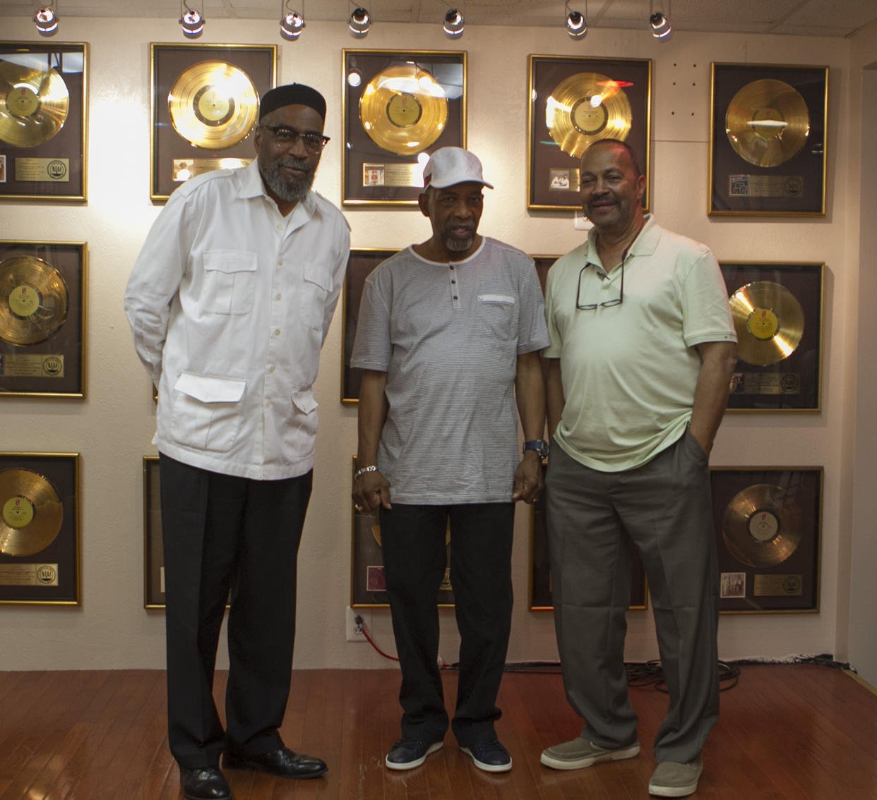 Musicians Kenneth Gamble, left, Leon Huff, center, and Thom Bell stand together at Gamble and Huff Music, on Broad Street, in Philadelphia, on Thursday, May 30, 2013. (Stephanie Aaronson/The Philadelphia Inquirer via AP)