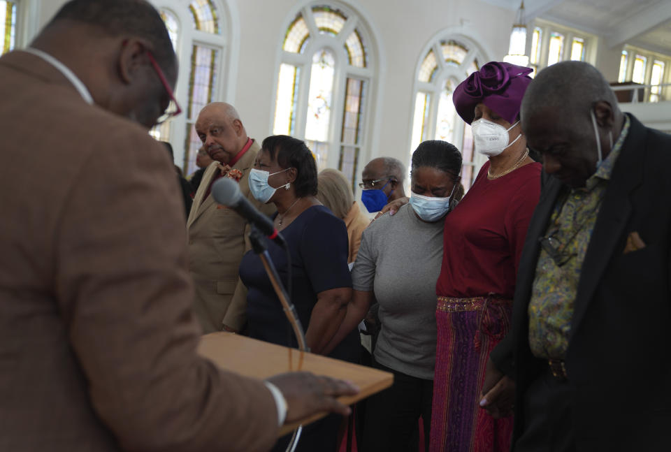 From left; Otis and the Rev. Cynthia Wlaters, Dalceada Williams, and Joan and Robert McDuffie, pray together at the front of the church on Sunday, April 16, 2023, at Zion Baptist Church in Columbia, S.C. Despite a drop in in-person church attendance, Zion's Rev. M. Andrew Davis says that the Black churches remain fundamental to the community by continuing to provide refuge and hope, especially during times of challenge. (AP Photo/Jessie Wardarski)