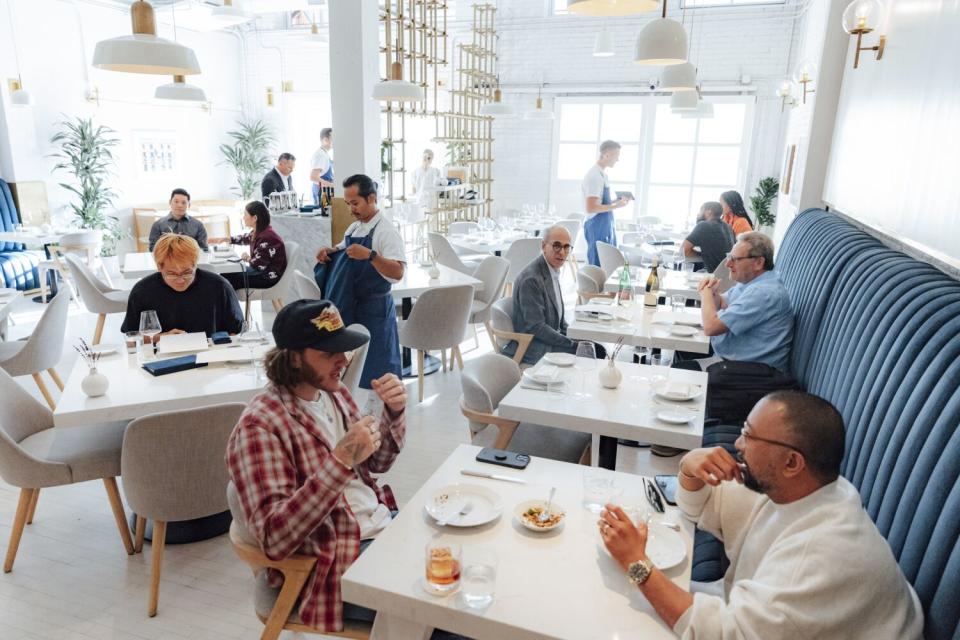 People inside a restaurant dining room