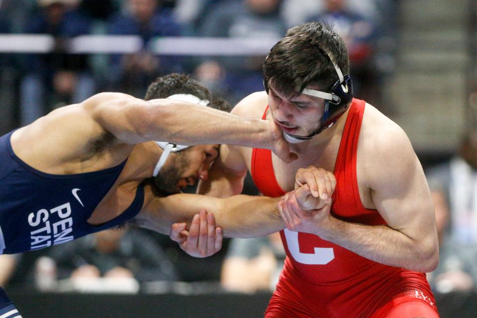 Cornell's Yianni Diakomihalis ties up with Penn State's Shayne Van Ness during the semifinal round of the NCAA Wrestling Championships 2023 at the BOK Center in Tulsa, Okla. on Friday, March 17, 2023.