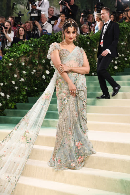 <p>Jamie McCarthy/Getty Images</p><p>The British actress and Hindi film star wowed the red carpet with this light green, silky number complete with a long, embroidered train. </p>