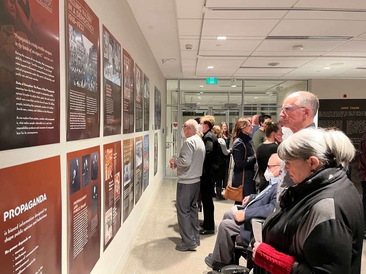 People filled the Holocaust exhibit at the Beaverbrook Art Gallery for its opening on Thursday evening. (Hannah Rudderham/CBC - image credit)