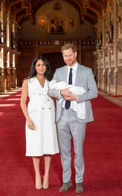 The Duke and Duchess of Sussex present their newborn son to the world - Credit: Dominic Lipinski/PA Wire