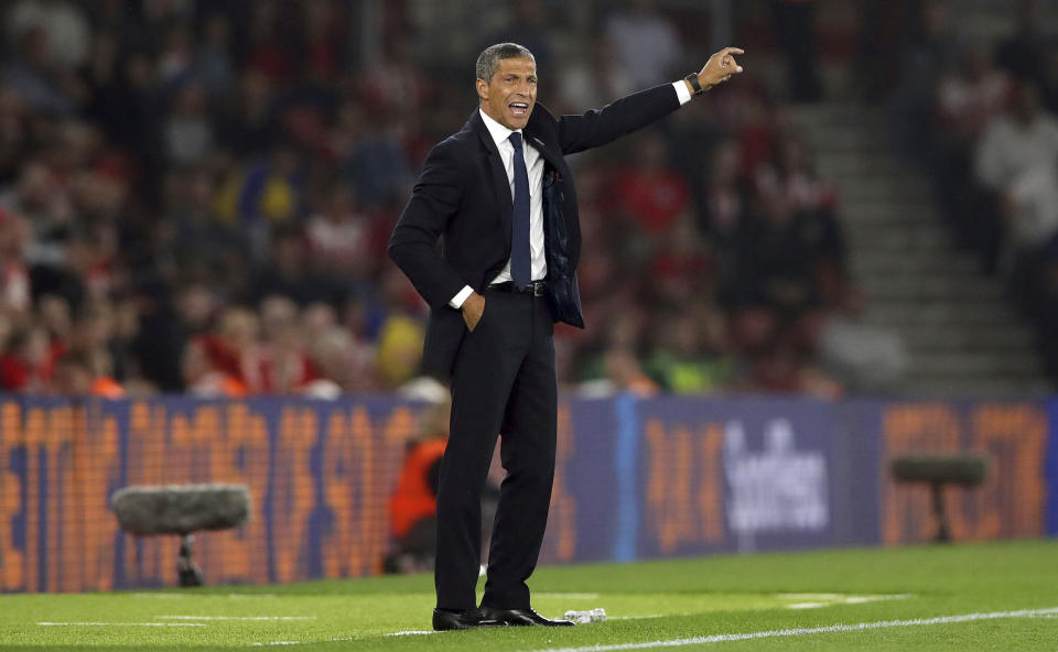 Brighton & Hove Albion manager Chris Hughton gestures on the touchline during the match against Southampton, during their English Premier League match at St Mary's in Southampton, England, Monday Sept. 17, 2018. (John Walton/PA via AP)