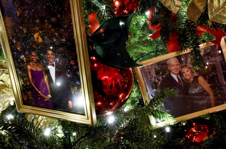 Photos of the Bidens and Obamas on a Christmas tree at the White House in 2021.