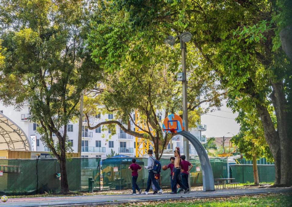 Kids play at the basketball court at Southside Park, located at 140 SW 11th St., in Miami, on April 2, 2024.