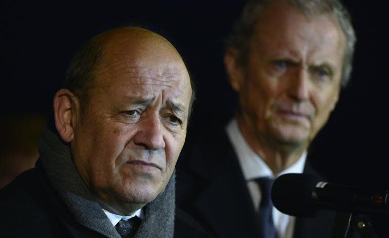 French Defence Minister Jean Yves Le Drian (L) and Spanish Defence Minister Pedro Morenes (R) hold a press conference at Los Llanos military base in Albacete on January 27, 2015