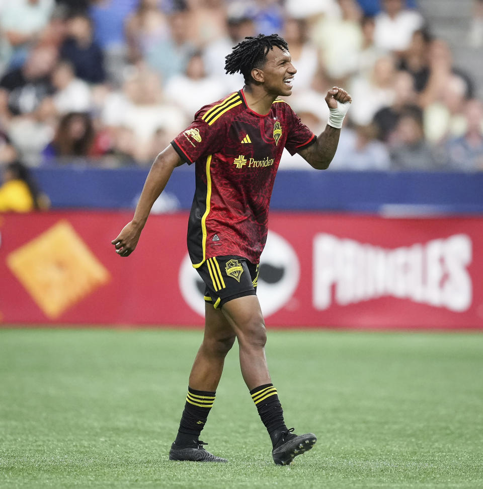 Seattle Sounders' Leo Chu celebrates his second goal against the Vancouver Whitecaps, during the second half of an MLS soccer match Saturday, July 8, 2023, in Vancouver, British Columbia. (Darryl Dyck/The Canadian Press via AP)