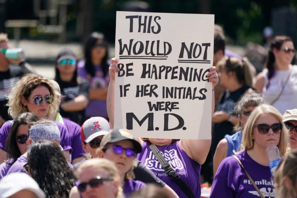 <div class="inline-image__caption"><p>People demonstrate outside the courthouse where the sentencing hearing for former nurse RaDonda Vaught was held in Nashville, Tenn.</p></div> <div class="inline-image__credit">AP Photo/Mark Humphrey</div>