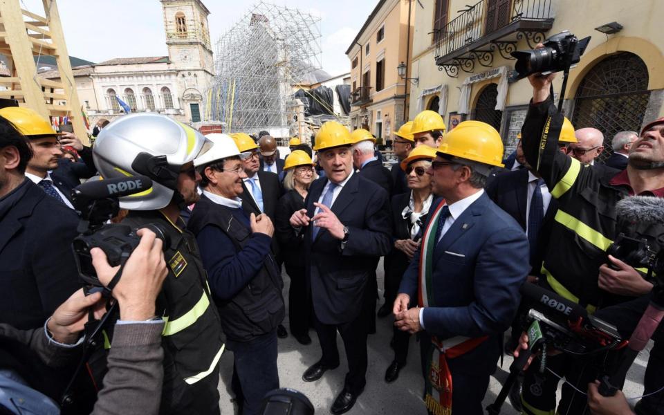 The president of the European Parliament Antonio Tajani (C) visits the historic centre of Norcia, a town in Umbria that was hit by an earthquake in October. - Credit: EPA