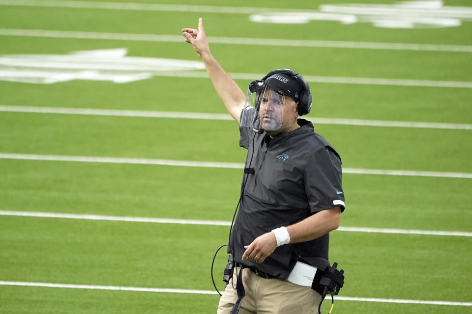 Carolina Panthers head coach Matt Rhule signals during the second half of an NFL football game against the Los Angeles Chargers Sunday, Sept. 27, 2020, in Inglewood, Calif. (AP Photo/Alex Gallardo)