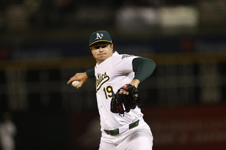 OAKLAND, CA - JUNE 19: Mason Miller #19 of the Oakland Athletics pitches during the game against the Kansas City Royals at the Oakland Coliseum on June 19, 2024 in Oakland, California. The Athletics defeated the Royals 5-1. (Photo by Michael Zagaris/Oakland Athletics/Getty Images)