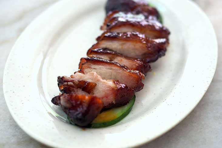 You can order a side portion of their 'char siew' to fully relish the not overly sweet tasting meat (left). The 'char siew' has meat marbled with fat for a satisfying bite (rigfht)