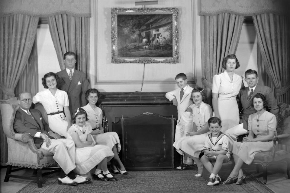 A portrait of the Kennedy family in the living room of their home in Bronxville, New York, in 1938.