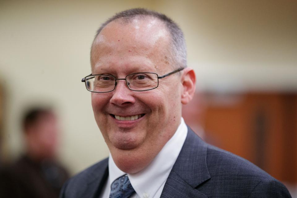 Florida Supreme Court communications director Craig Waters celebrates with friends and family during his retirement party Wednesday, Feb. 9, 2022.