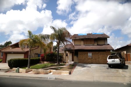 A suburban home that was the site of a hash oil extraction laboratory explosion is seen in the Mira Mesa area of San Diego