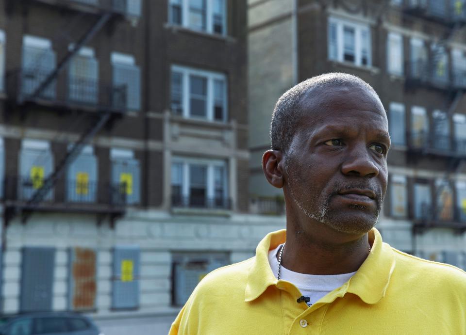 Dannis Billups shown outside the Aspen Stratford Apartments, the building in Newark, New Jersey where he started dealing drugs as a teenager in the 1980s.