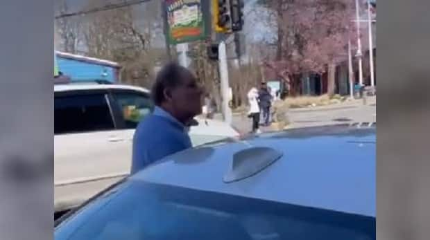 A screen grab from a video circulating on social media in which a man is heard hurling racist slurs in the Steveston area of Richmond, B.C. (instagram/bre_d - image credit)