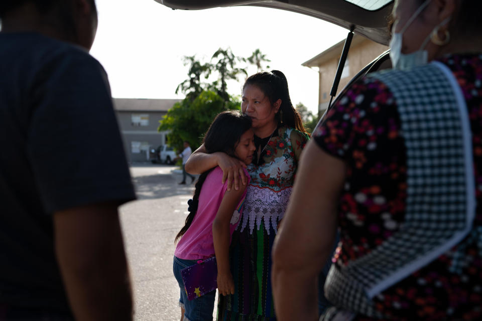 Maria Chic, 34, gives her daughter, Adelaida Chic, 10, a hug in Fort Myers, Florida, on June 20, 2021. Chic was among the first migrant parents separated from their children under the Trump administration to be reunited.  / Credit: Sarah L. Voisin/The Washington Post via Getty Images