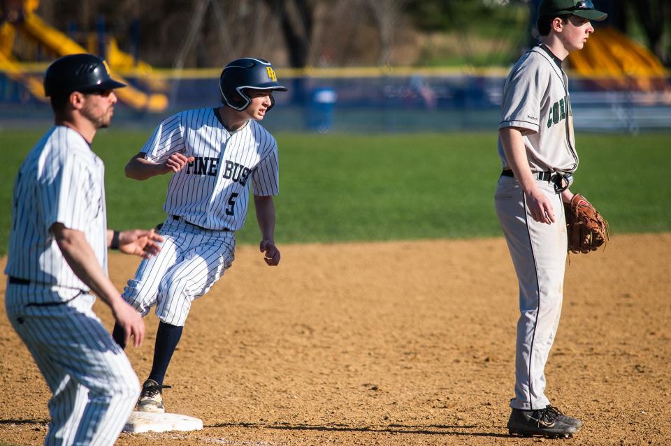 Pine Bush's Matt Boffalo lands on third base during the Section 9 baseball game in Pine Bush, NY on Tuesday, April 12, 2022. Cornwall defeated Pine Bush.