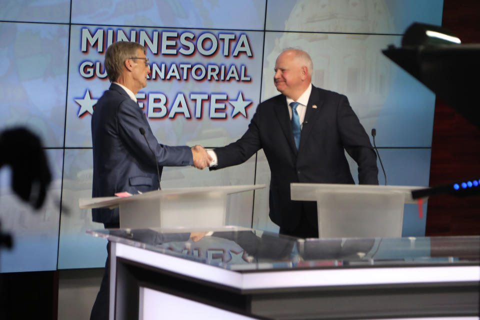 Minnesota Republican gubernatorial candidate Scott Jensen, left, and Democratic Gov. Tim Walz, shake hands before their debate at the studios of KTTC-TV in Rochester, Minn., on Tuesday night, Oct. 18. 2022. It was their only scheduled televised debate of the campaign. (Ben Mulholland/Pool Photo via AP)