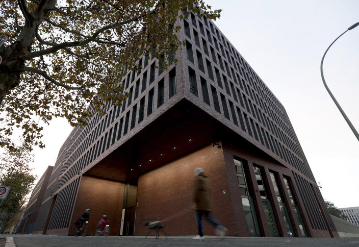 People walk past the center for advanced education at the Federal Intelligence Service in Berlin (Michael Sohn / AP file)