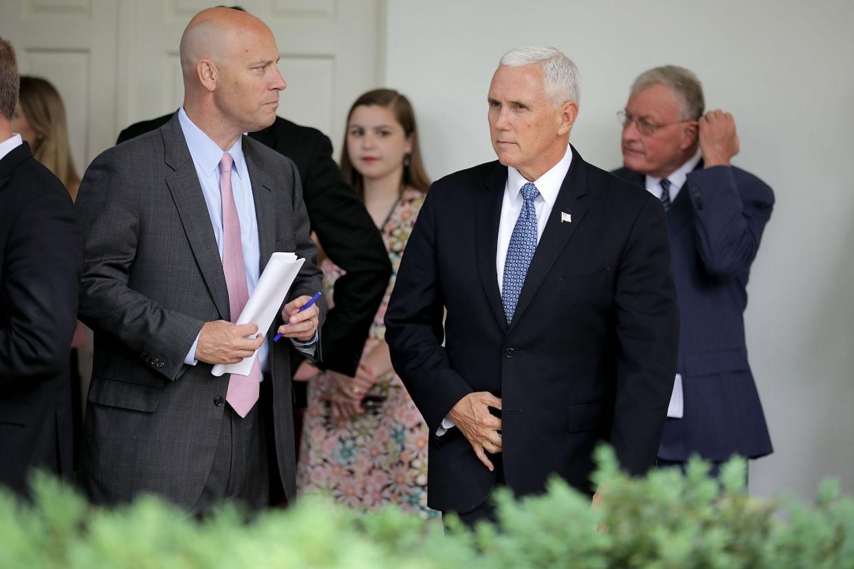 Mike Pence's right-hand man Marc Short (L), joins the then-vice president at a White House bill signing ceremony in 2018.